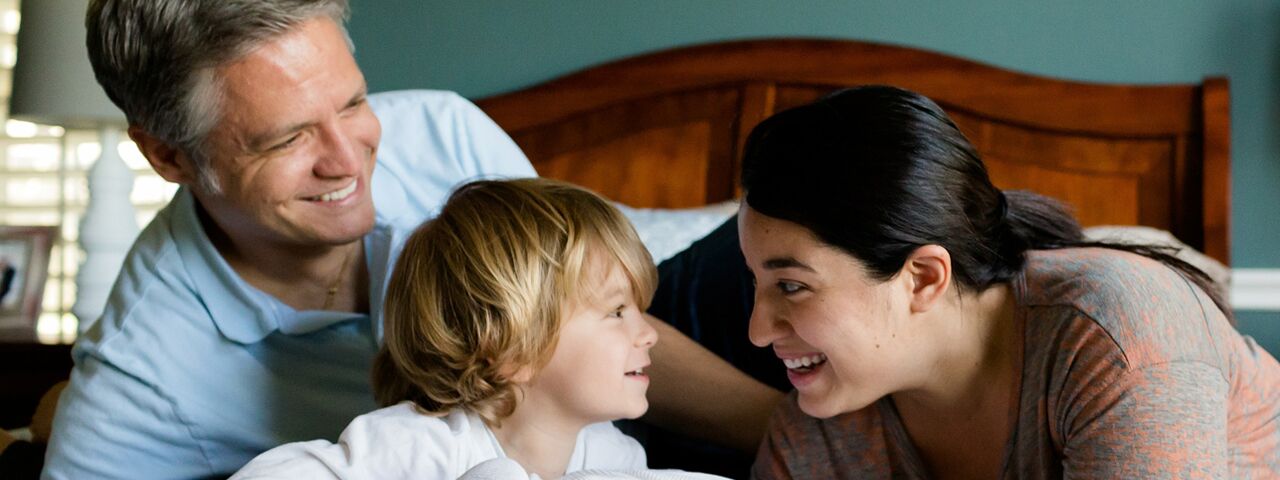 Happy Parents with Child, do they need eye condition treatment?
